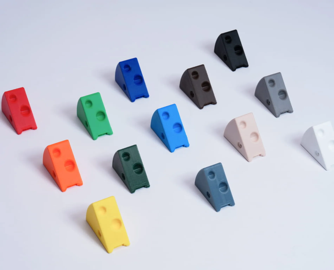 Morceaux d'emmental imprimés avec les couleurs BambuLab PETG Basic