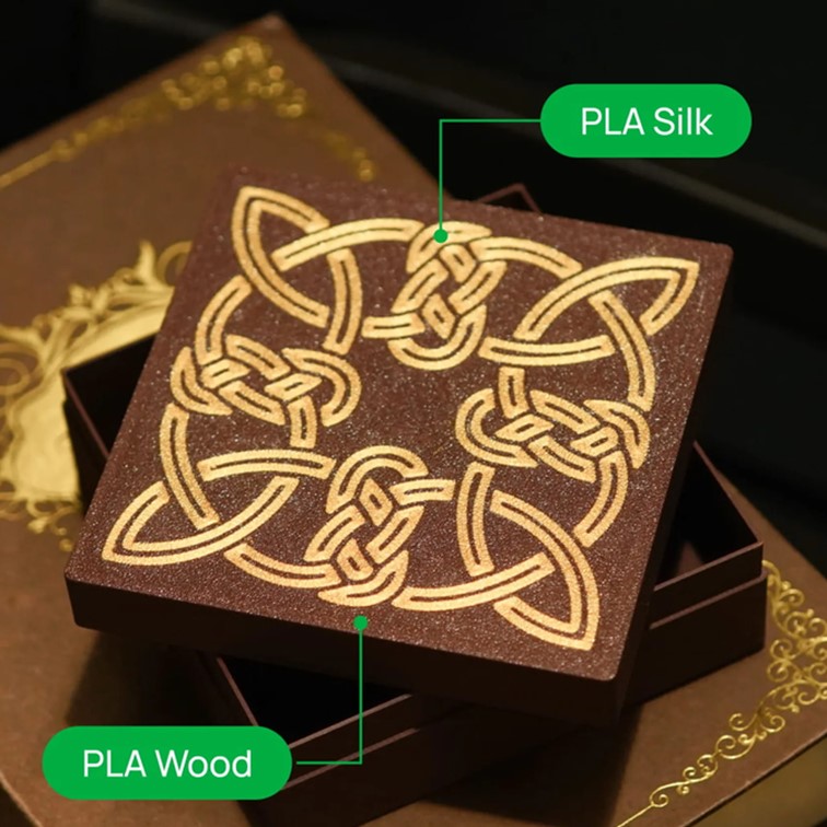comparaison sur une boîte celtique fait en impression 3d d'un coté fait avec du PLA Silk et d'un autre avec du PLA Wood Bambu Lab
